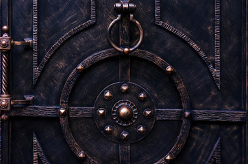 Decoration of metal doors with exquisite forged elements