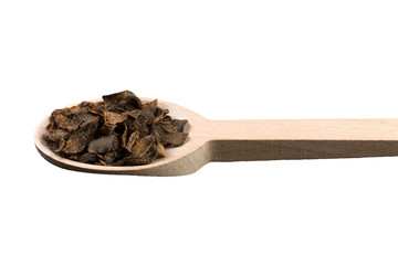 truffle in wooden spoon isolated on white background. Closeup.