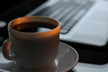 Cup of coffee on the table for Breakfast