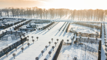  Aerial view of Rundale palace and baroque garden covered in snow at a sunny winter's day. Unique...
