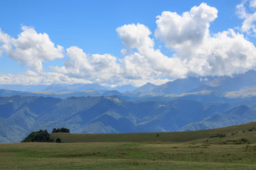Closeup view mountains and valley scenes in national park Dombai, Caucasus