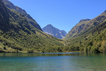 Fototapeta na wymiar Lake scenes in mountains, national park Dombai, Caucasus, Russia