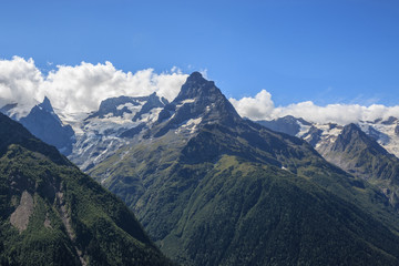 Fototapeta na wymiar Closeup view mountains scenes in national park Dombai, Caucasus, Russia