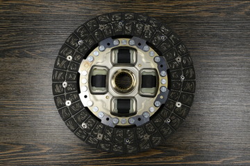 Clutch on wooden background