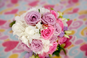 wedding bouquet and rings