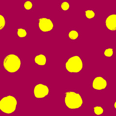 Repeating round spots drawn by hand with a rough brush. Simple seamless pattern. Sketch, watercolor, paint. Yellow and purple color.