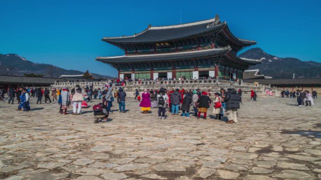 Hyper lapse of tourists swarming through Gyeongbokgung Palace in Seoul City,South Korea