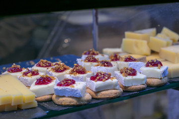 Mini sandwiches food set. Brushetta or authentic traditional spanish tapas for lunch table. Delicious snack, appetizer, antipasti in San Miguel Market, Madrid, Spain