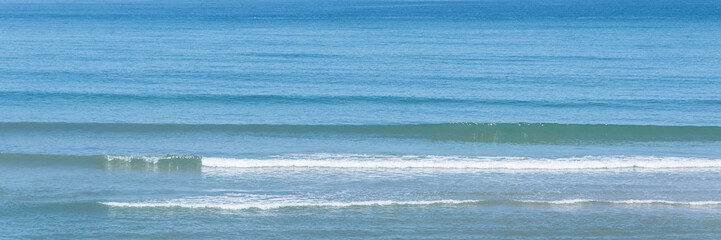 Panorama of the ocean with small waves © Delphotostock