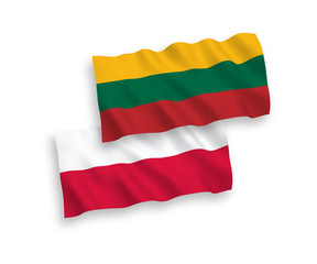 National vector fabric wave flags of Lithuania and Poland isolated on white background. 1 to 2 proportion.