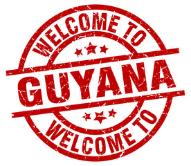 welcome to Guyana red stamp