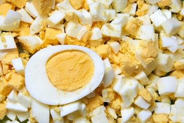 Boiled egg cut in half and also sliced egg