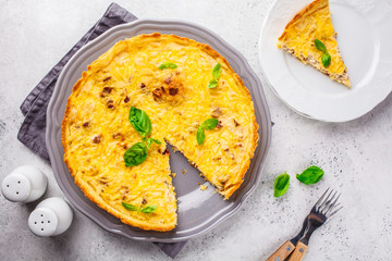 Homemade tuna pie with tomatoes and basil.