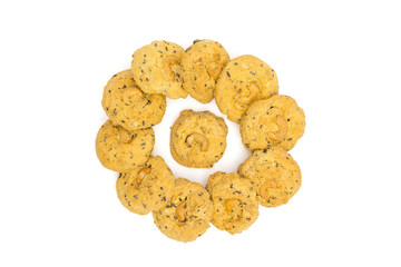 butter cookies with cashew nuts isolated on white background, top view