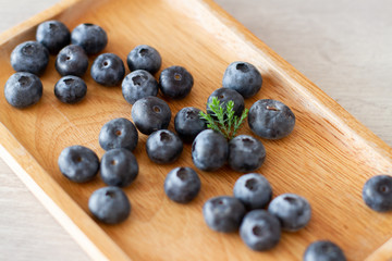blueberries on wooden board