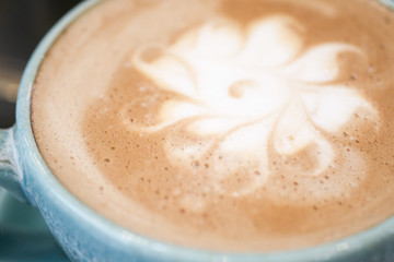 Hot coffee is placed on the table.
