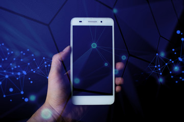hand pick mobile smartphone with internet business network marketing concept