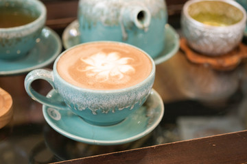 Hot coffee is placed on the table.