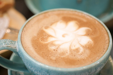 Hot coffee is placed on the table.
