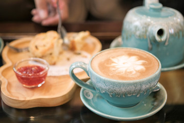Hot coffee is placed on the table.