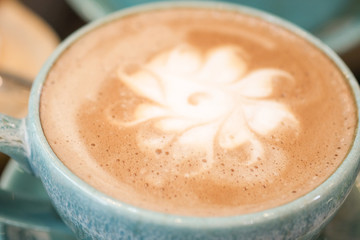 Hot coffee is placed on the table.
