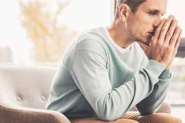Fototapeta premium Man feeling disturbed thinking about health problems