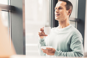 Man feeling happy waiting for his wife from work