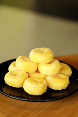 Fried donut with sugar, popular sweet  sold in market or restaurant, high calories, sugar and cholesterol level cause of many chronic disease such as diabetes and heart disease affect economic problem