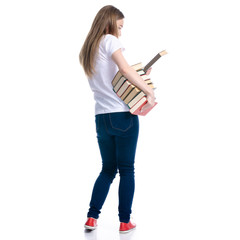 Woman in jeans stack of books in hand on white background isolation, back view