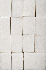 background from cubes of white sugar refined