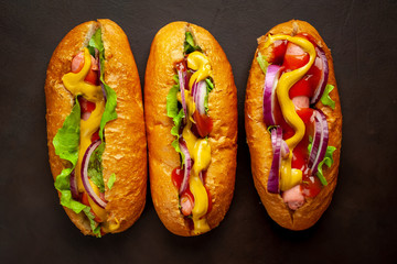 homemade hot dogs on concrete background, slate