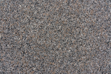The floor in the room of marble chips black and white.