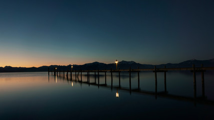 Fototapeta na wymiar old wooden pier at sunrise