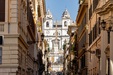 Rome Italy. Via Condotti with in background Trinità dei Monti, the famous staircase that overlooks Piazza Di Spagna.