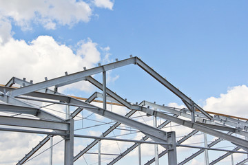 The structure of the building. Steel construction on the sky background. Electroplate steel metal. Zinc metal coating to protect against corrosion.