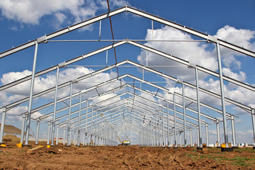 The structure of the building. Steel construction on the sky background. Electroplate steel metal. Zinc metal coating to protect against corrosion.