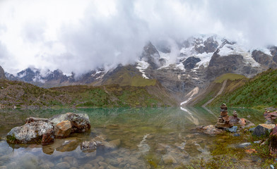 Stacked stones on Humantay lake in Peru , cusco