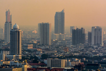 Bankkok, The capital of Thailand with building and skyscrapers in evening.
