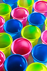 multi colored plastic cups, full frame