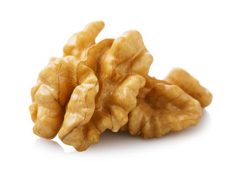 Peeled walnut isolated on white background