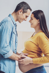 Profile photo of happy couple that looking at each other