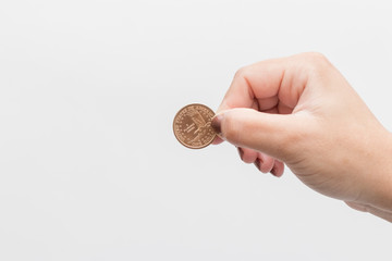 woman hand holding 1 dollar coin from Sacagawea