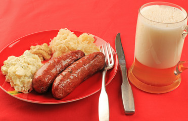 Grilled Sausage with Sauerkraut and Potato Salad and Beer