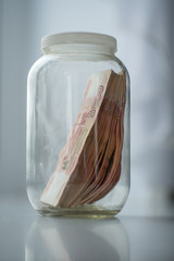 Russian money in glass jar