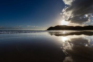 Lonely Beach at sunrise Waikawau Bay campsite, Coromandel, New Zealand