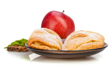 Apple and Cinnamon and mint buns on dish. 