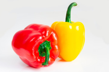 Bulgarian pepper red and yellow on a white background