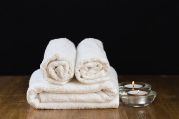 Spa still life with aromatic candles and towel. - Image.