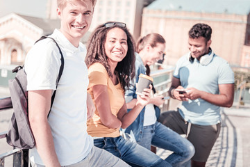 Positive group mates looking at camera
