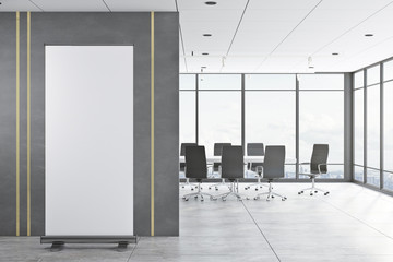Modern meeting room with empty banner